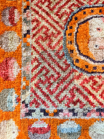 Antique meditation seat rug with unique circular motifs