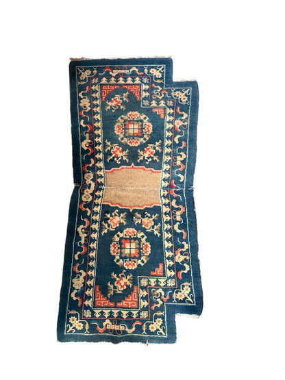 A vintage indigo saddle rug