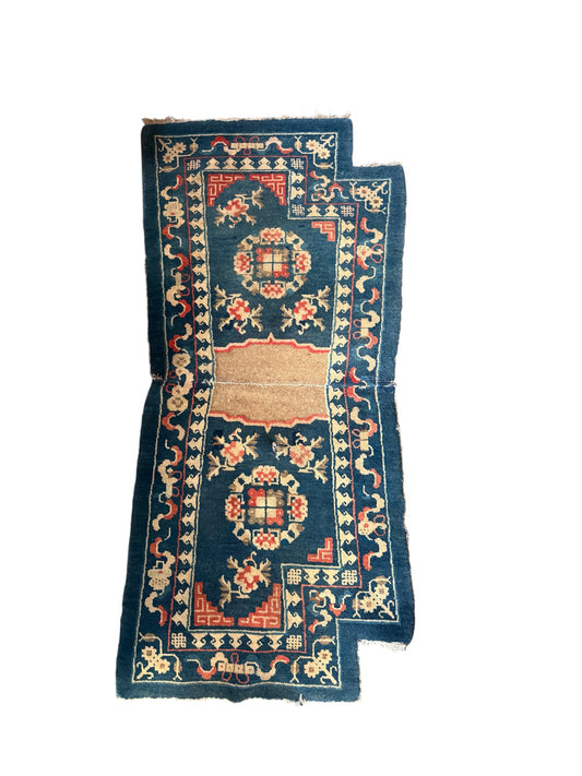 A vintage indigo saddle rug