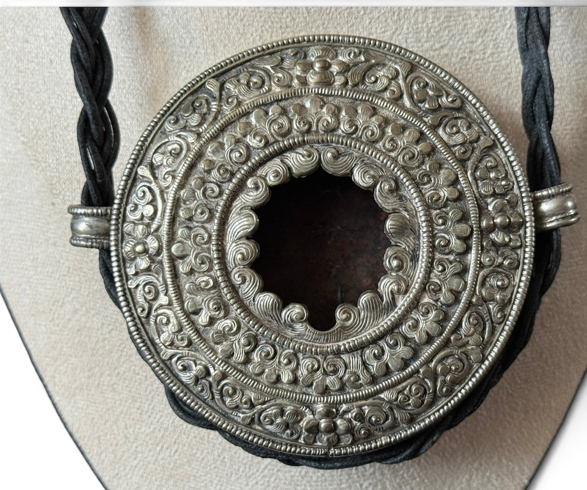Antique Tibetan Silver Ghau (Portable Carrying Shrine) with Intricate Repoussé Decoration and Brass Back Cover