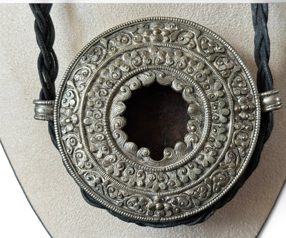 Antique Tibetan Silver Ghau (Portable Carrying Shrine) with Intricate Repoussé Decoration and Brass Back Cover
