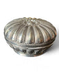 An antique silver south East Asian round box with lid