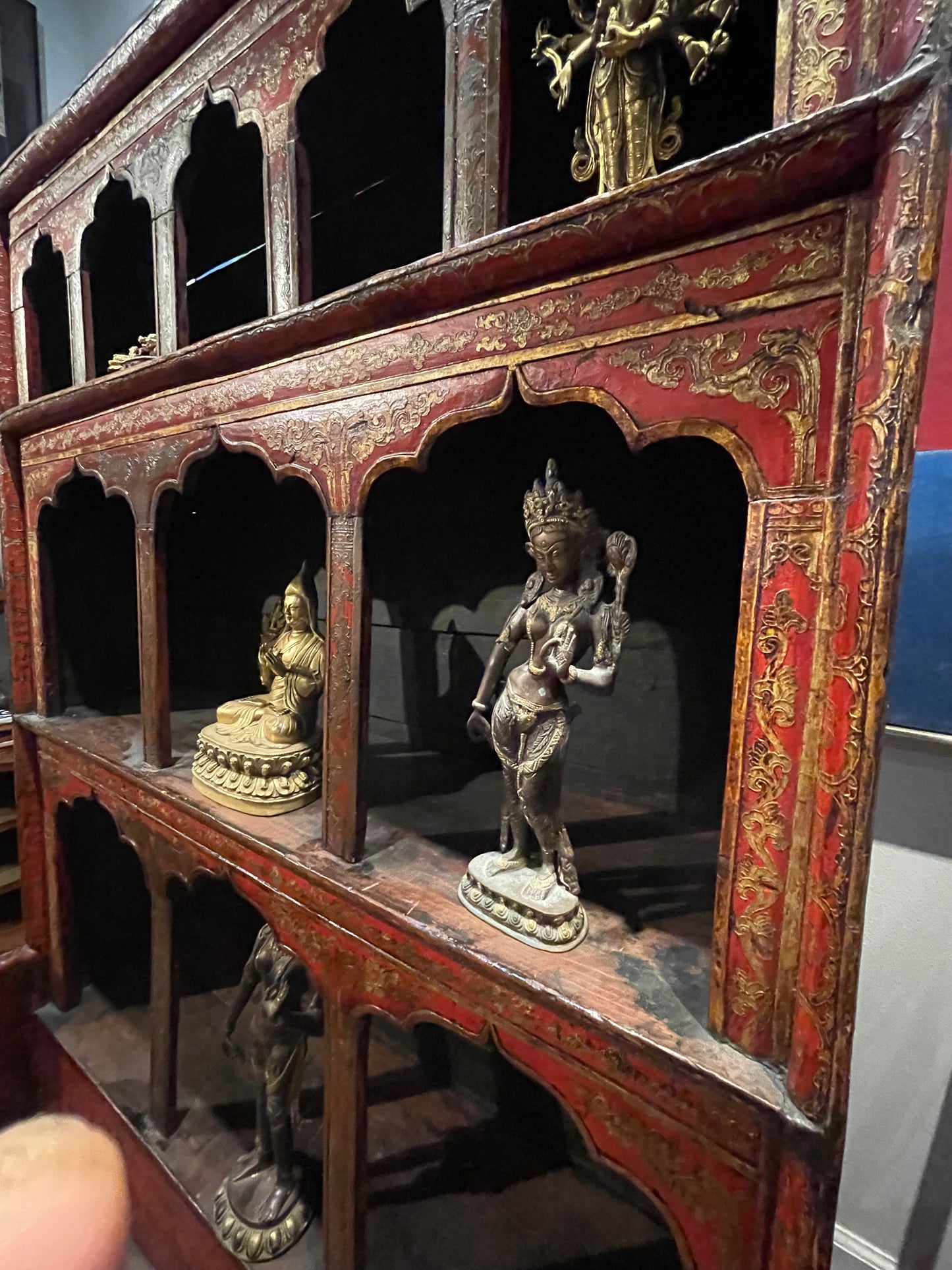 An antique late 19th. c. Tibetan shrine cabinet
