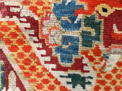 An early 20th C., antique Tibetan dragon rug