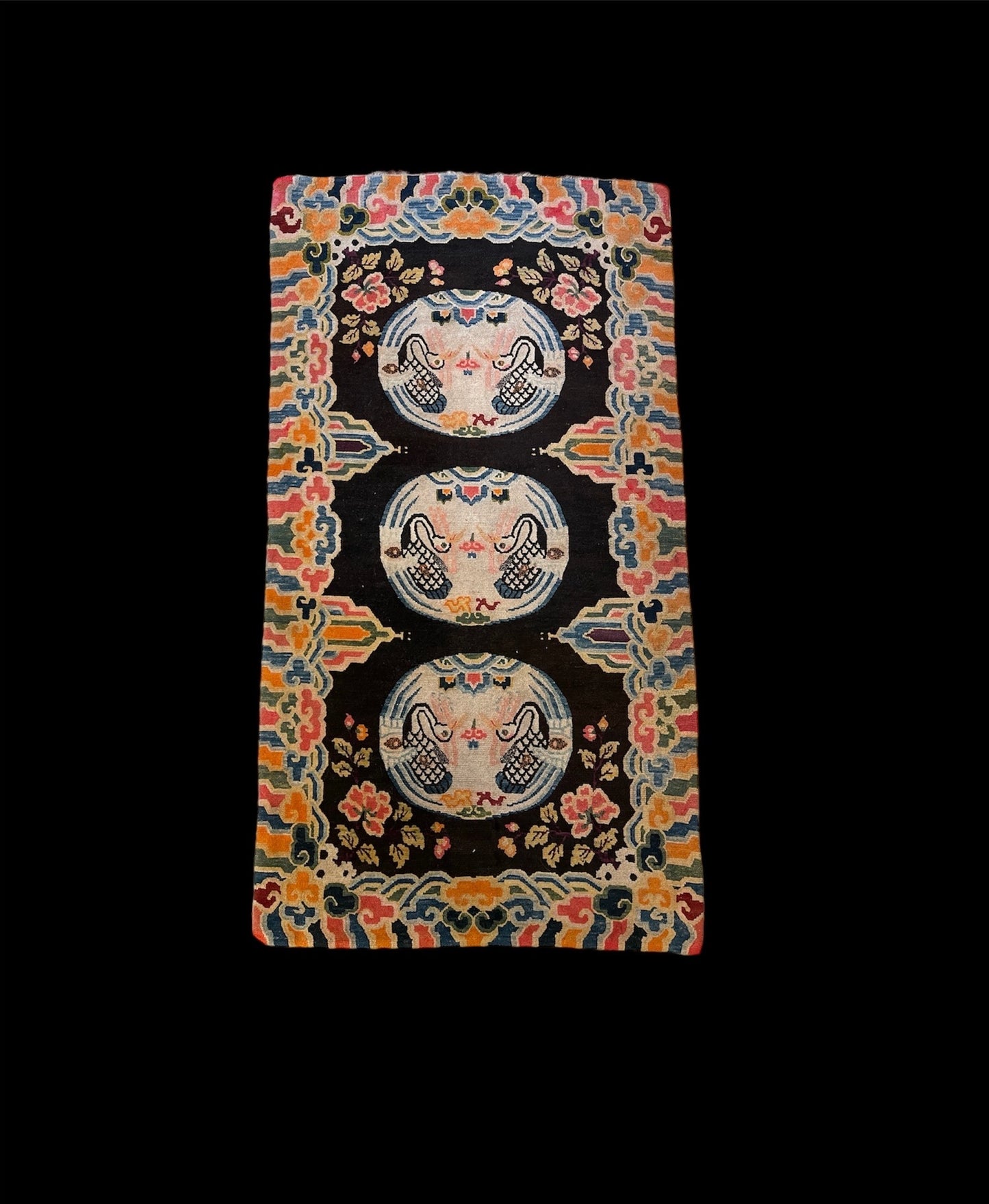 An antique early 20th c., Tibetan rug
