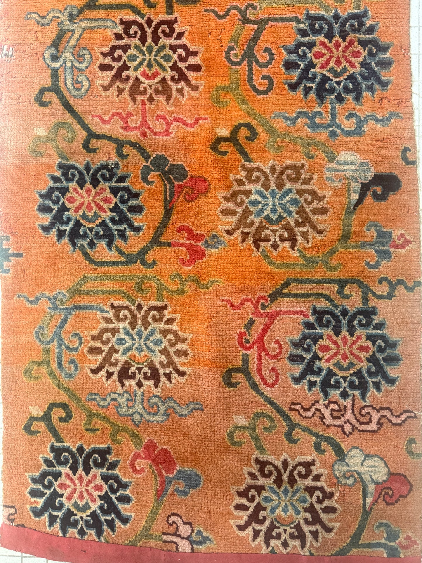 An early 20th C., antique Tibetan floral  cushion rug