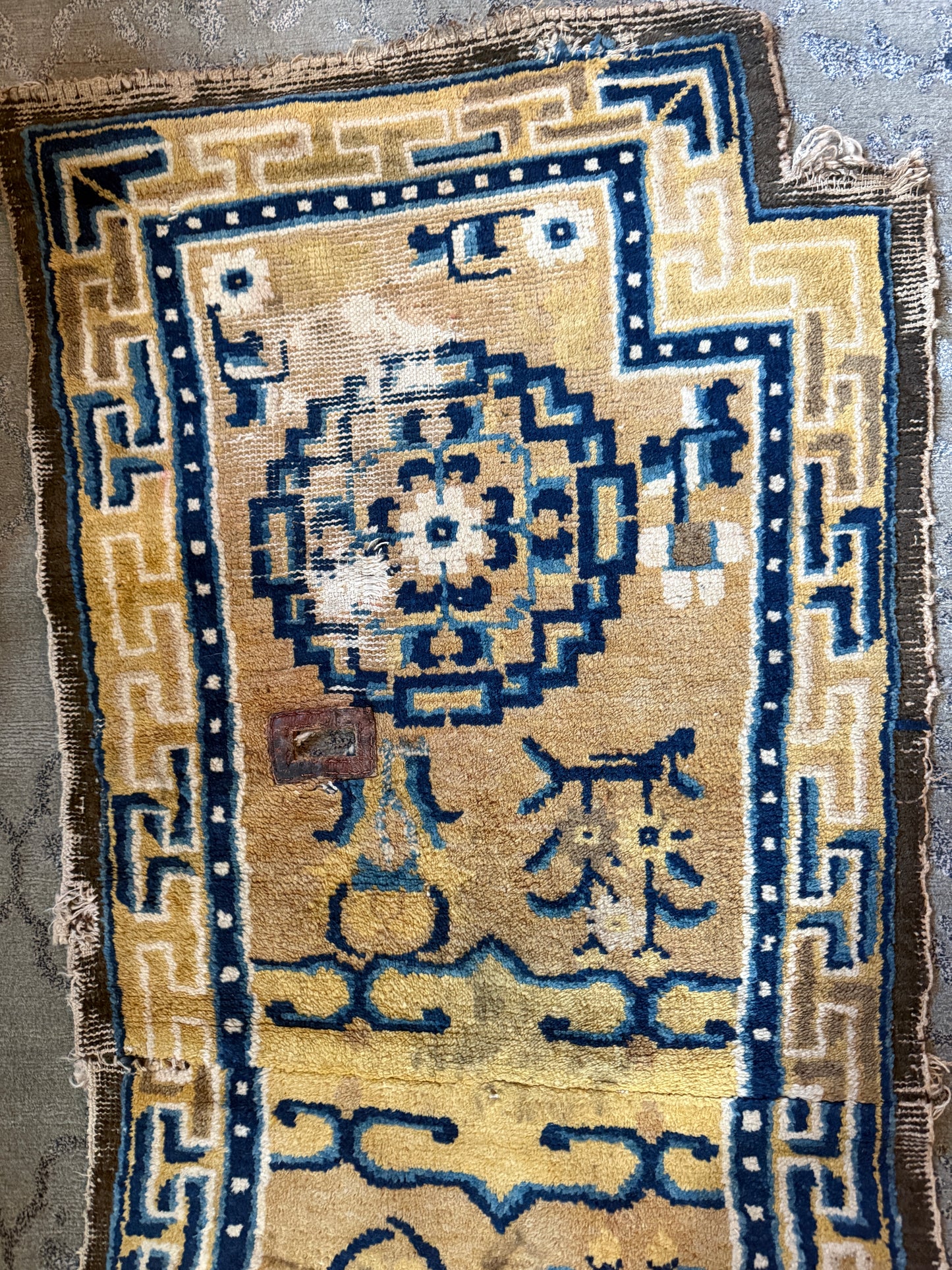 Antique Tibetan saddle rug