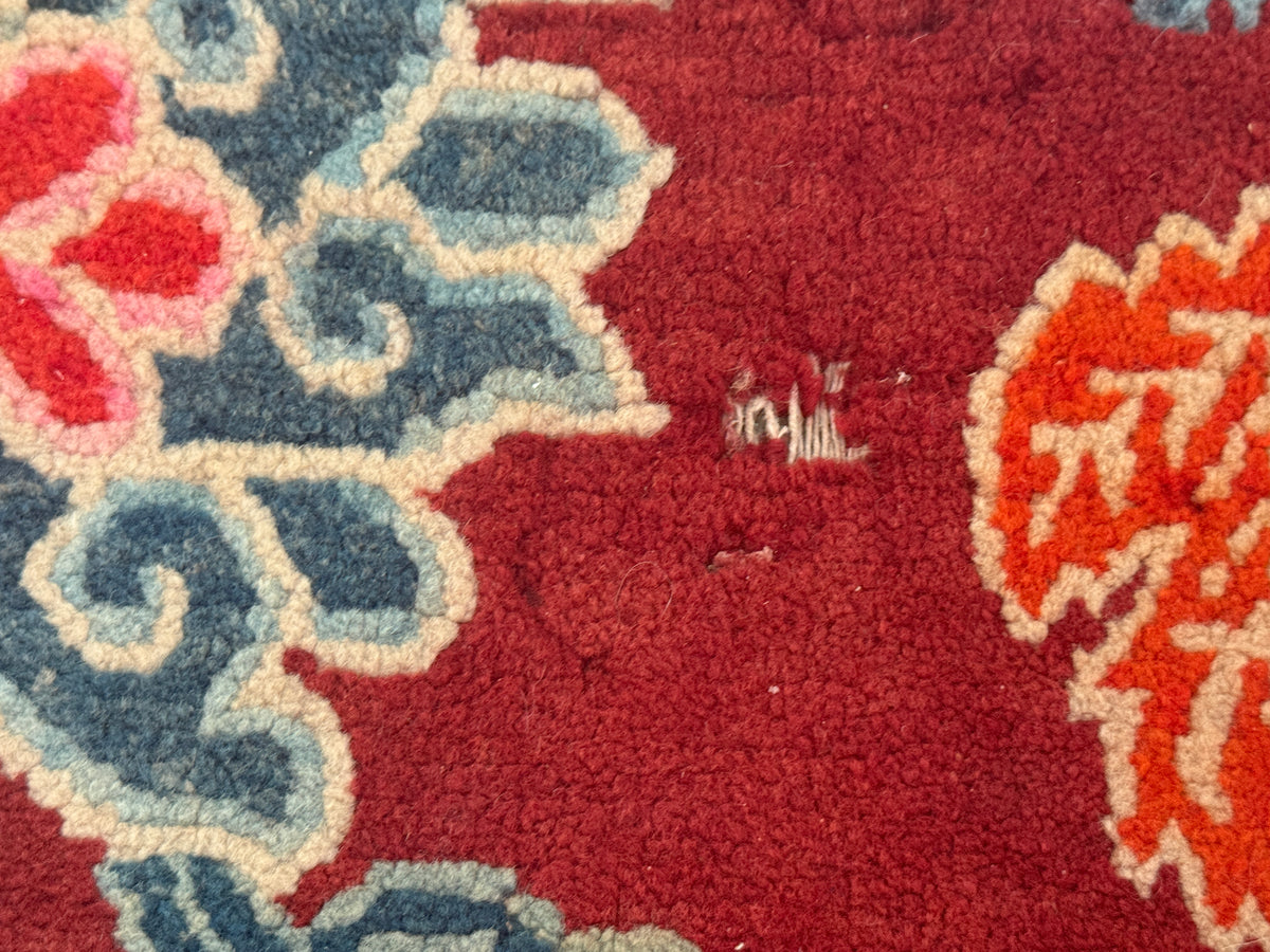 An early to mid 20th C., antique Tibetan floral  cushion rug (Copy)