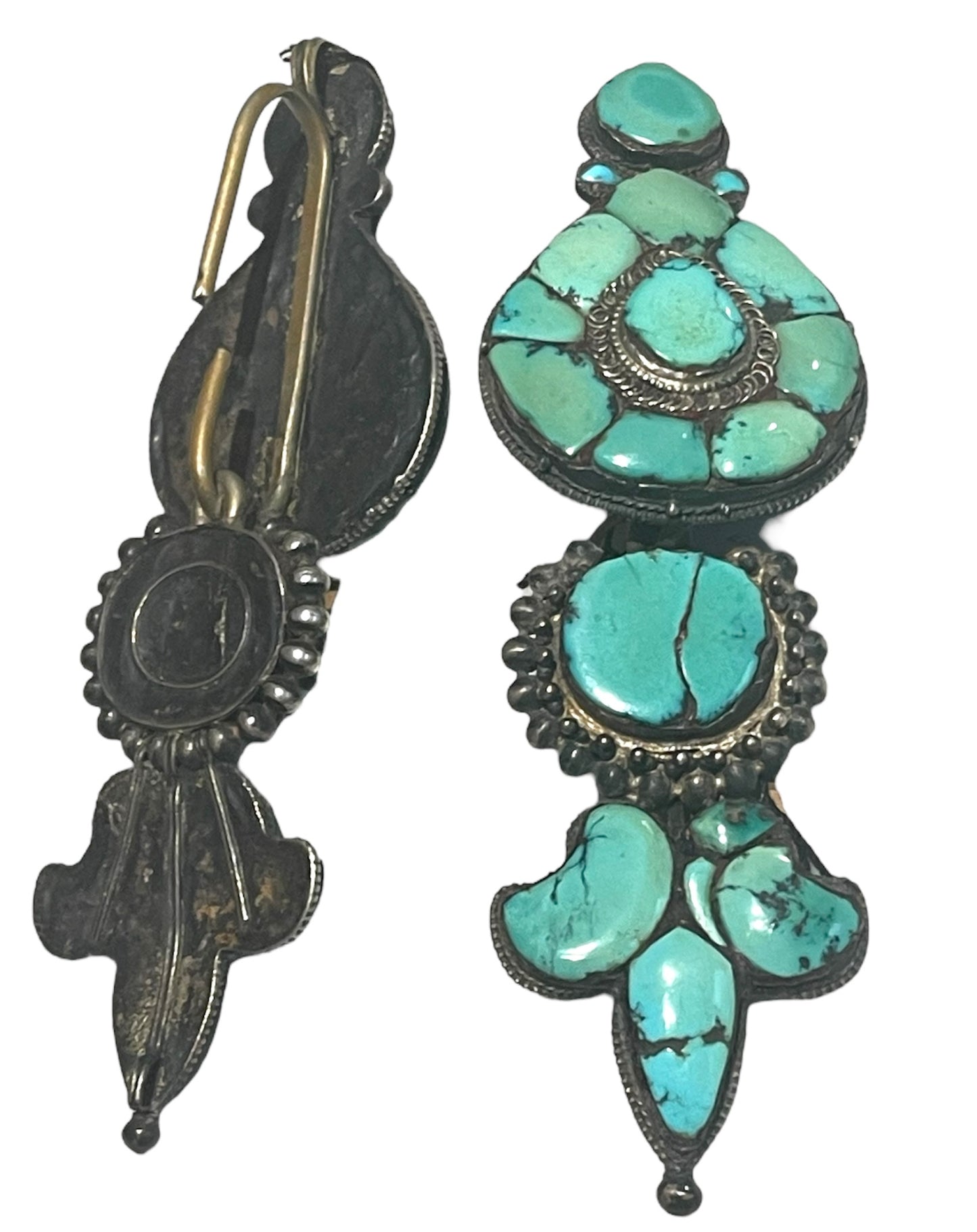 A pair of antique Tibetan turquoise and silver ear pendants