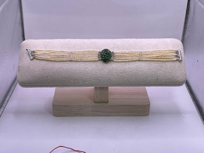 an antique seed pearl and jade plaque bracelet