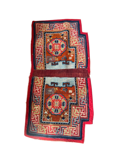 An antique Tibetan saddle rug