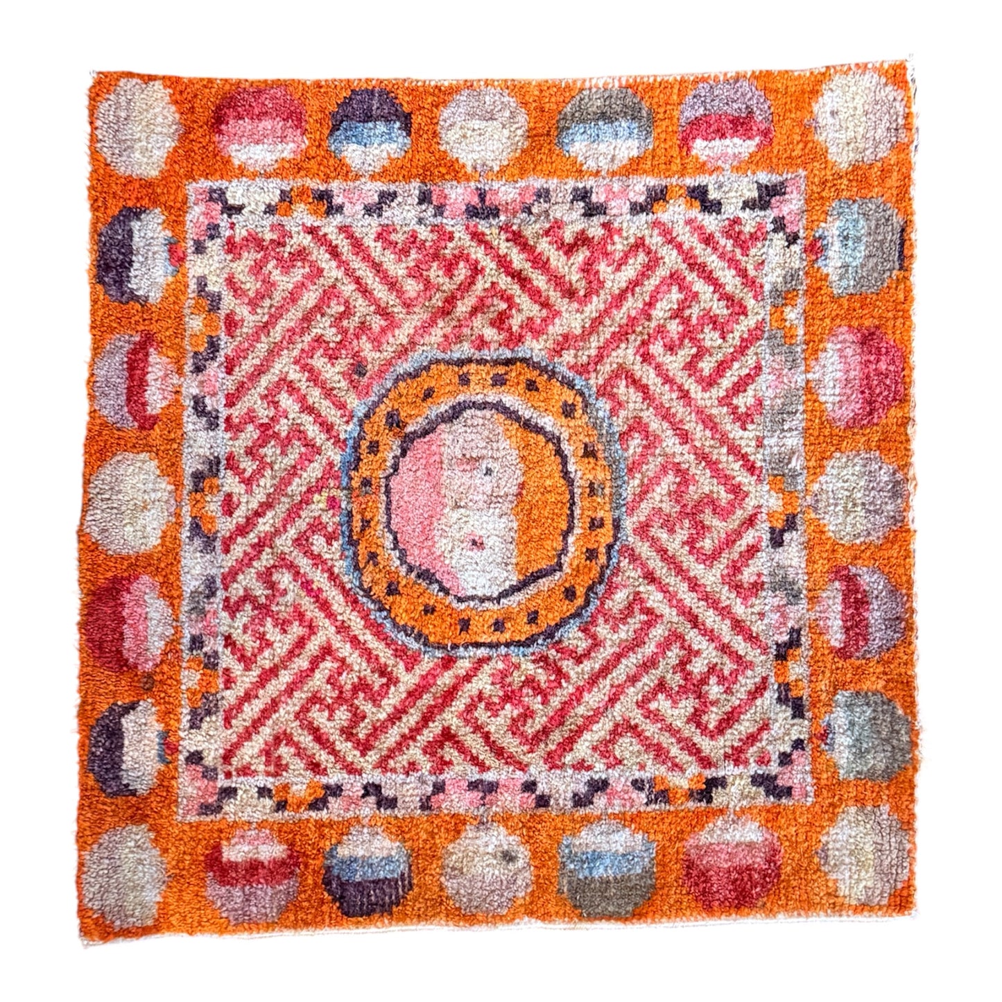 Antique meditation seat rug with unique circular motifs