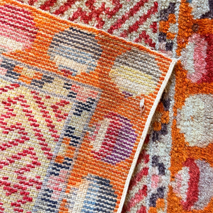 Antique meditation seat rug with unique circular motifs