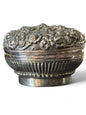 An antique silver south East Asian round box with lid