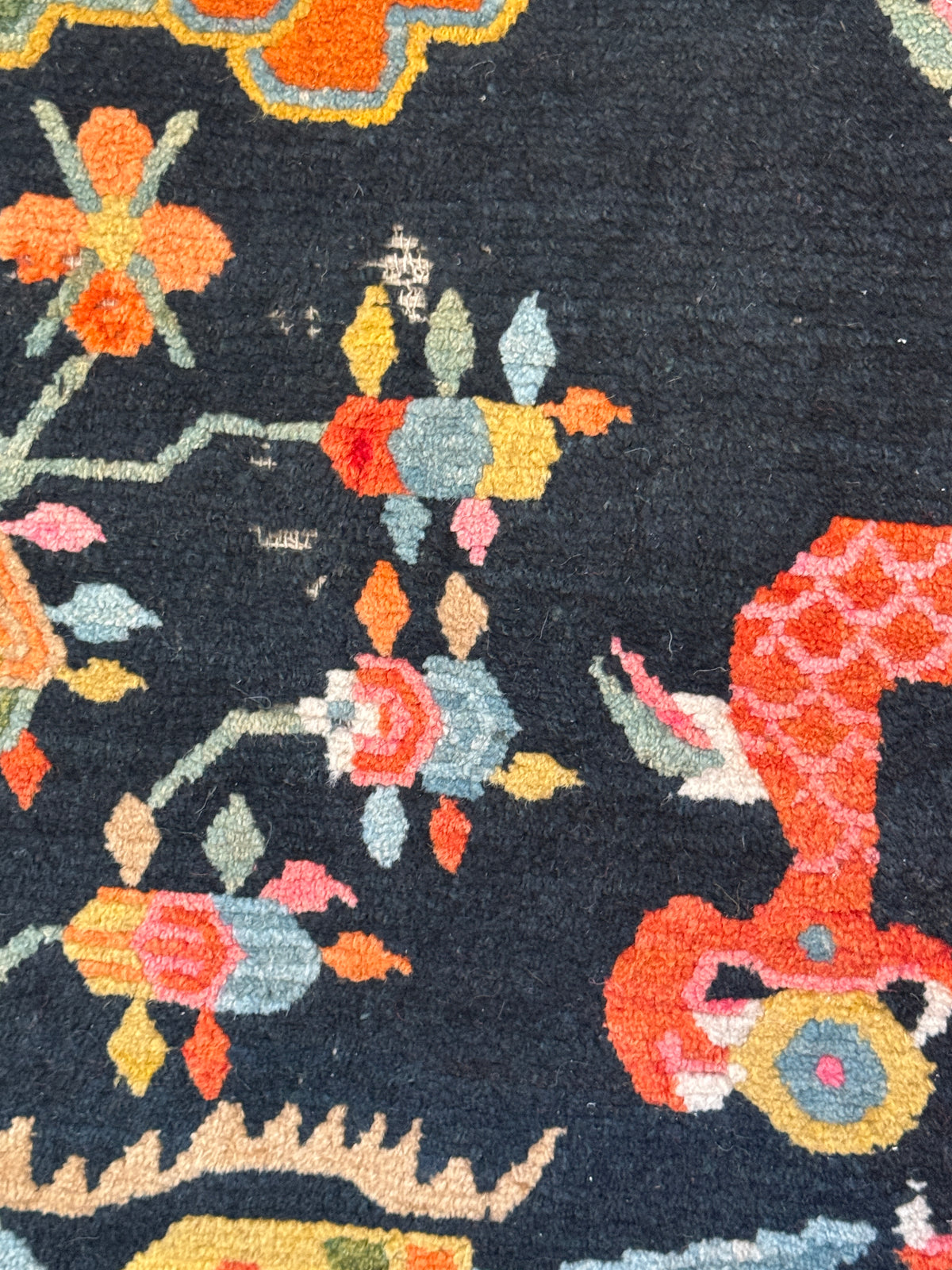 Early 20th C., antique Tibetan dragon rug