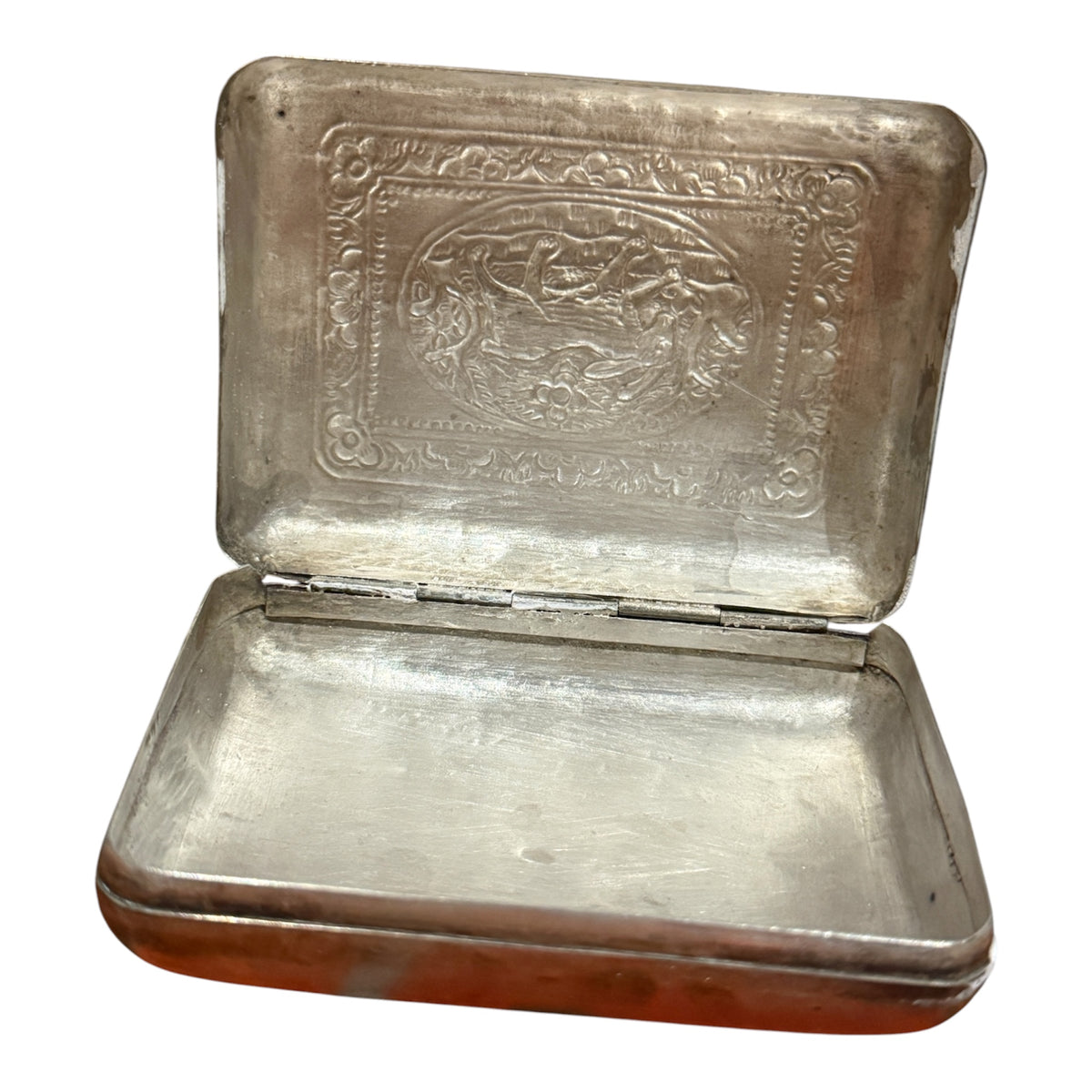 A silver box with hinged lid