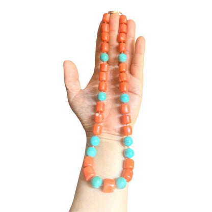 A coral and turquoise bead necklace