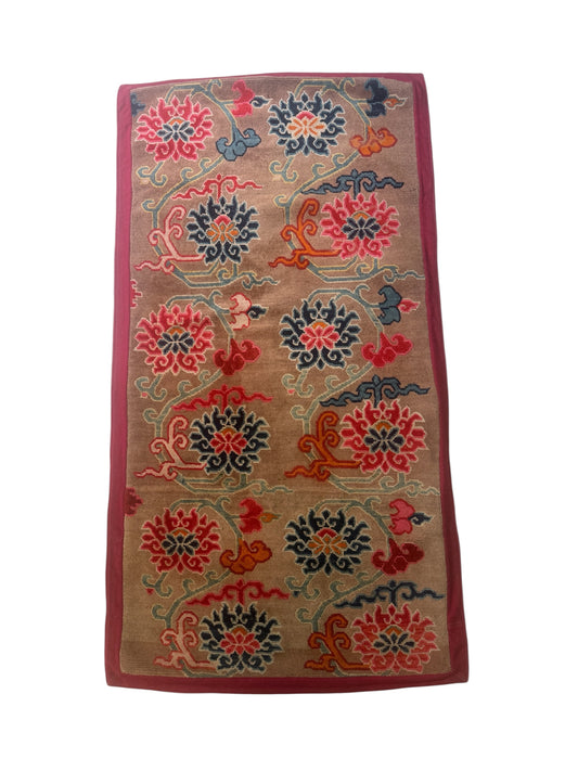 An early to mid 20th C., antique Tibetan floral  cushion rug