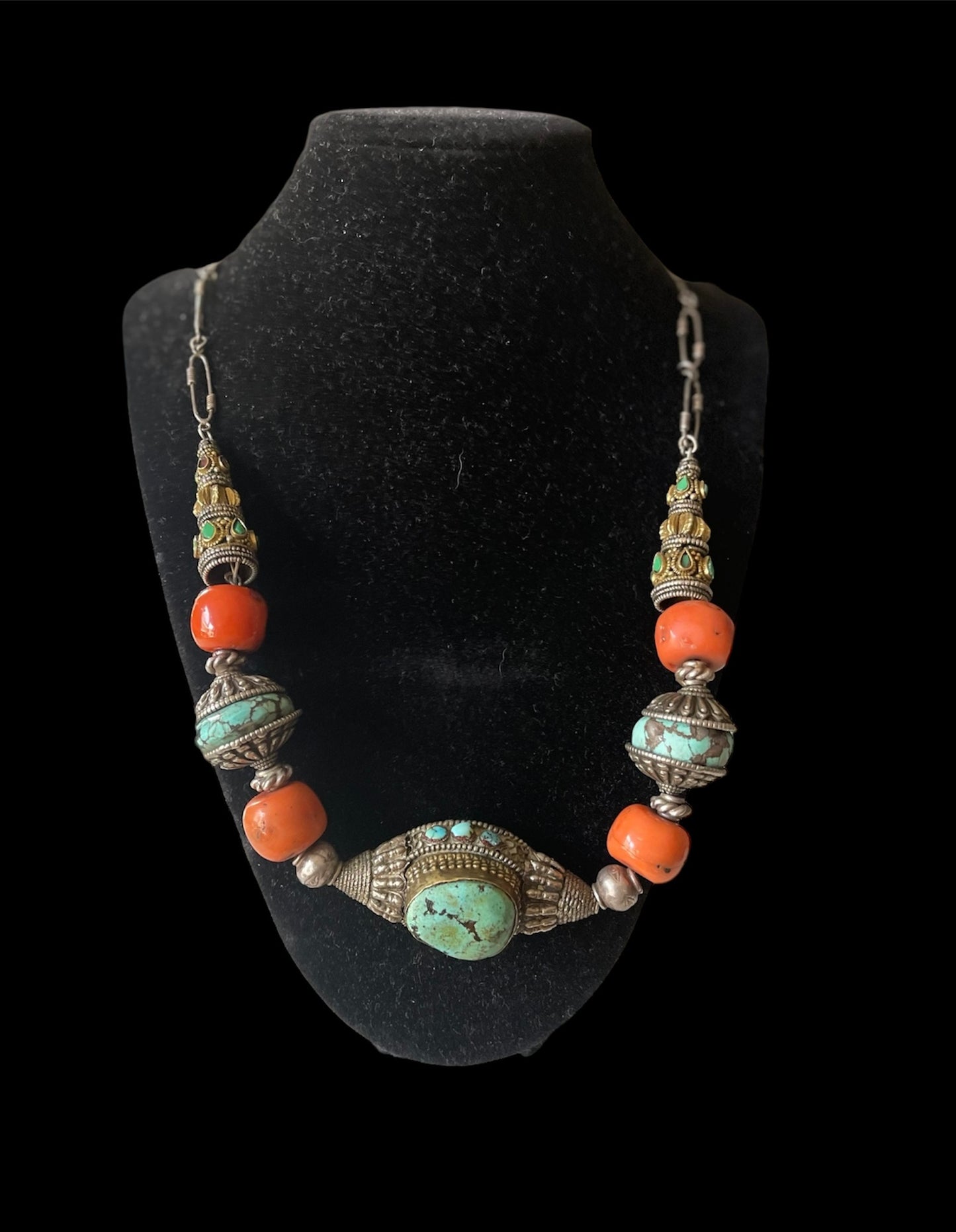 A necklace with antique Tibetan silver beads and coral