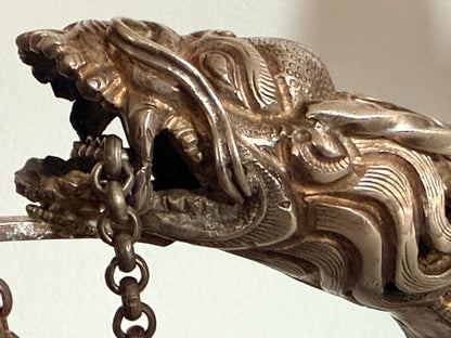 An antique silver and gilt ceremonial Tibetan teapot