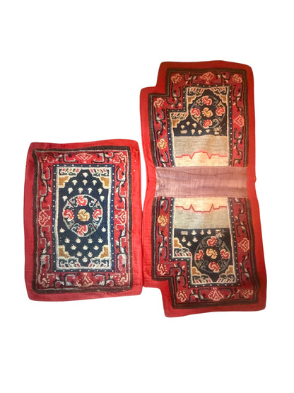 An antique Tibetan saddle rug and rug topper set