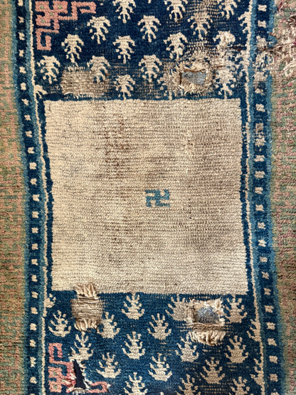 An antique mid 19th C saddle blanket/rug