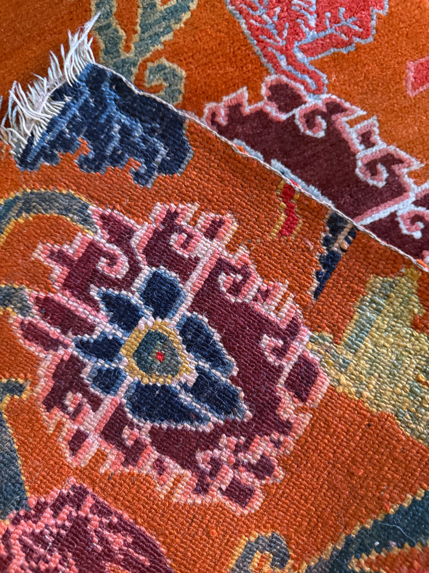 An early 20th C., antique Tibetan floral  cushion rug