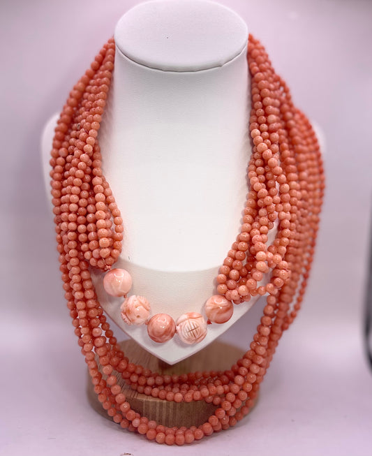 A multi strand coral bead necklace