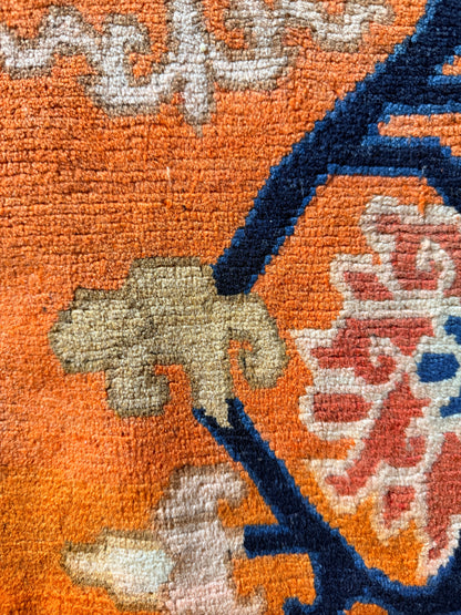 Antique Tibetan lotus meditation rug