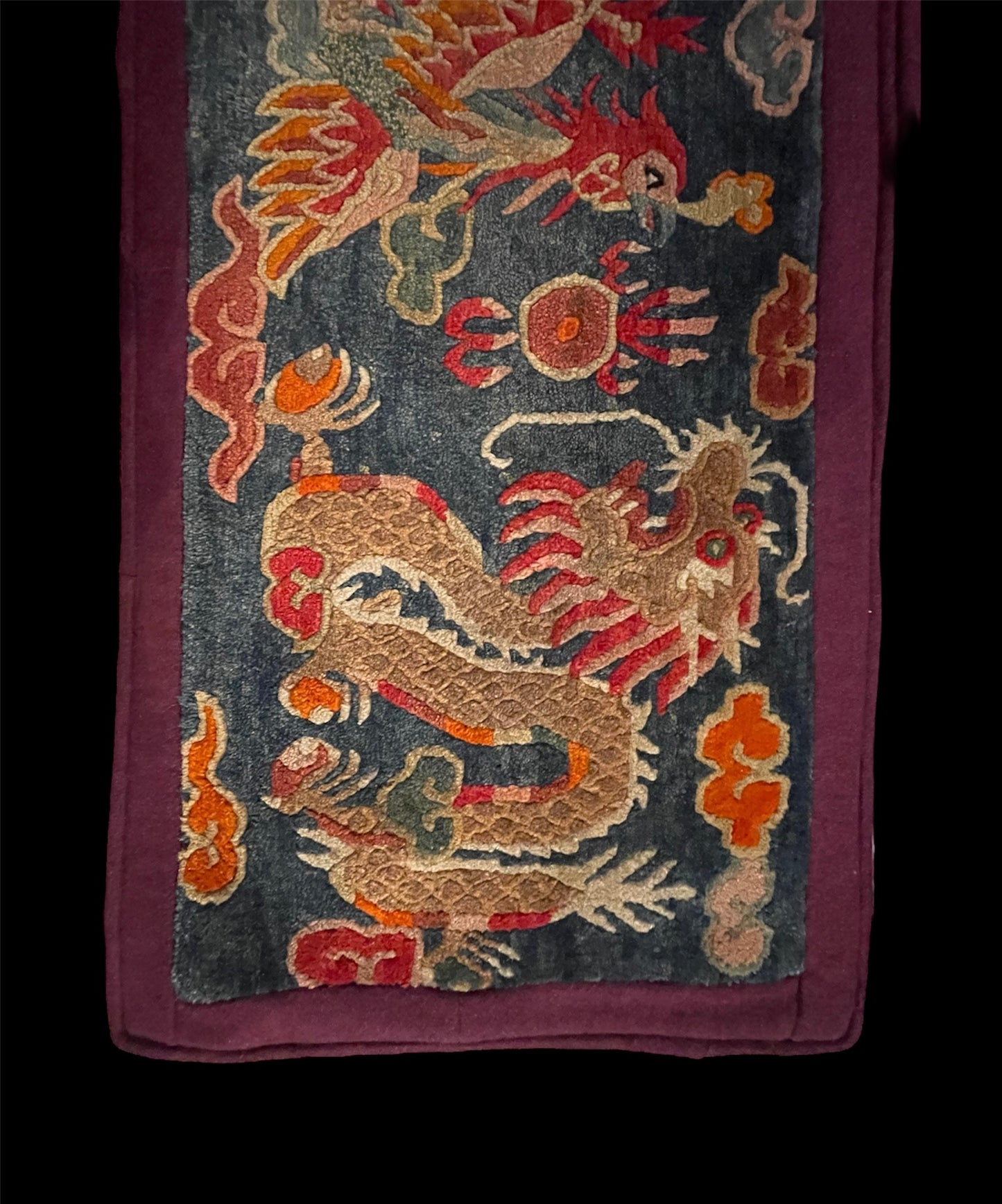 Early 20th C., antique Tibetan dragon and phoenix rugs