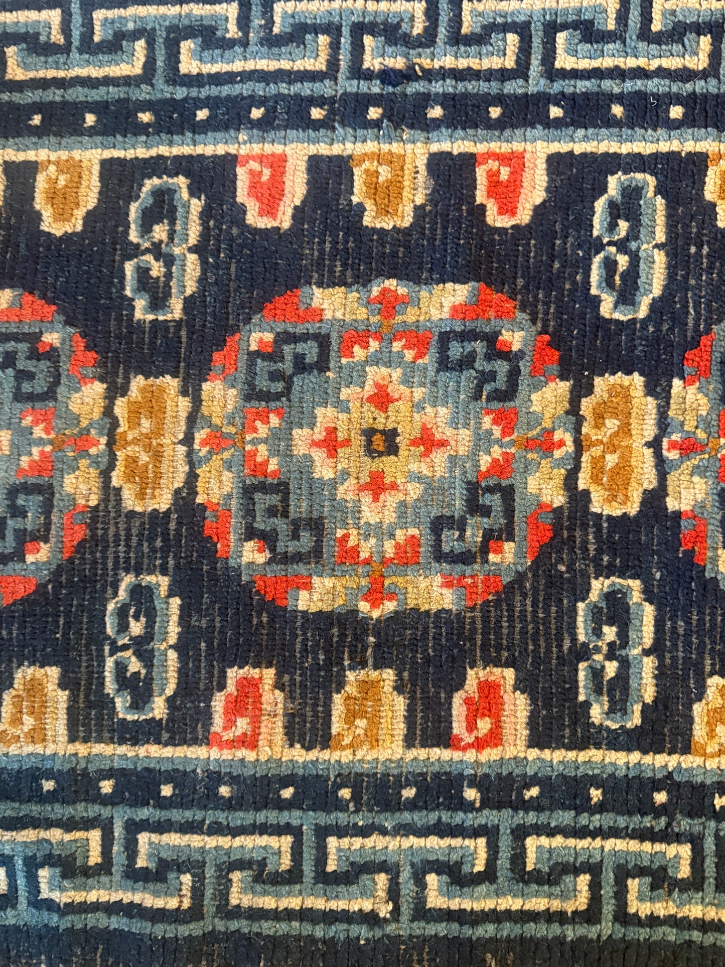 Antique 19th Century navy blue Tibetan woolen rug