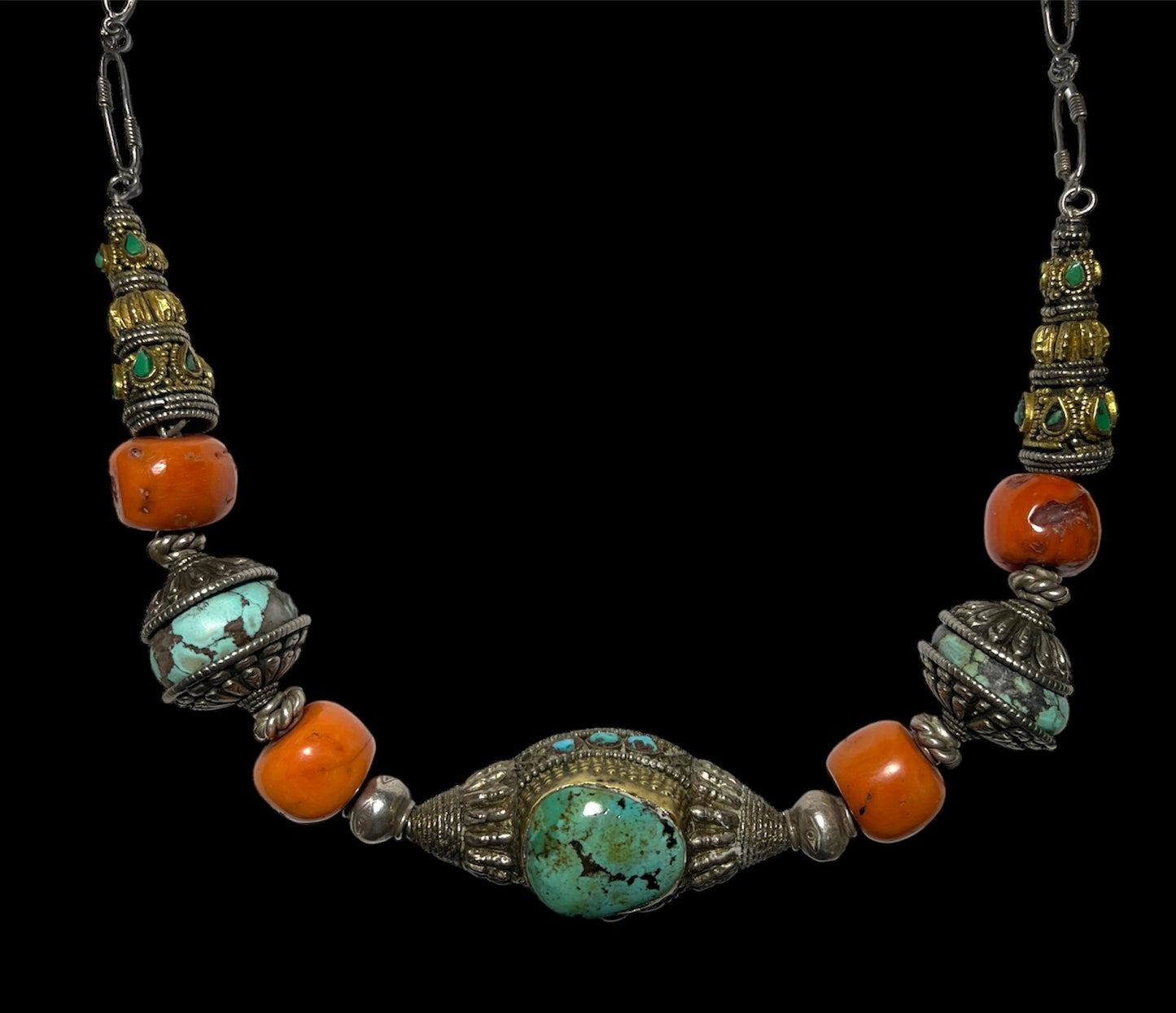 A necklace with antique Tibetan silver beads and coral