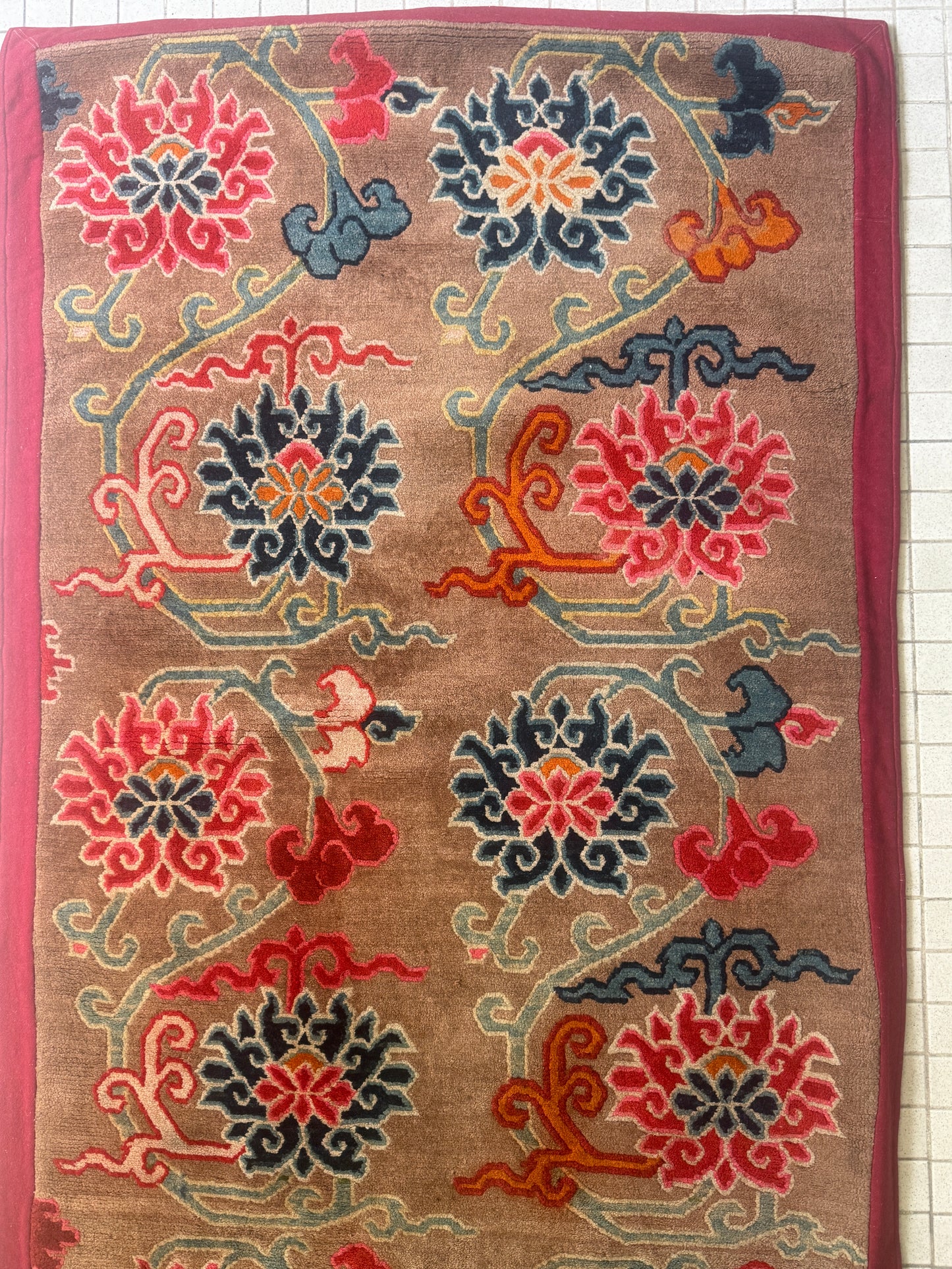 An early to mid 20th C., antique Tibetan floral  cushion rug