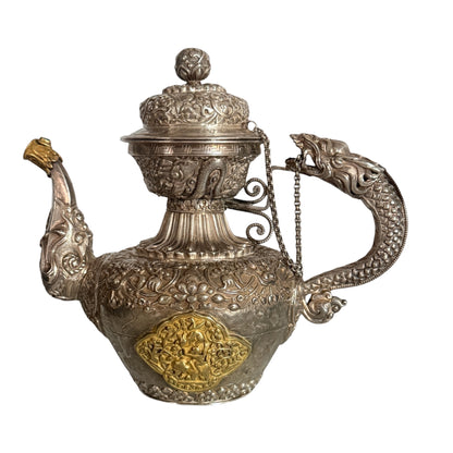 An antique silver and gilt ceremonial Tibetan teapot