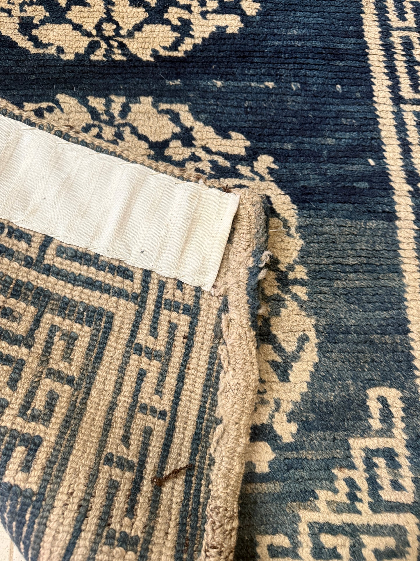 An antique Tibetan residential  rug with medallions