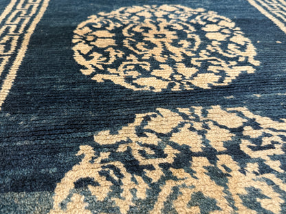 An antique Tibetan residential  rug with medallions