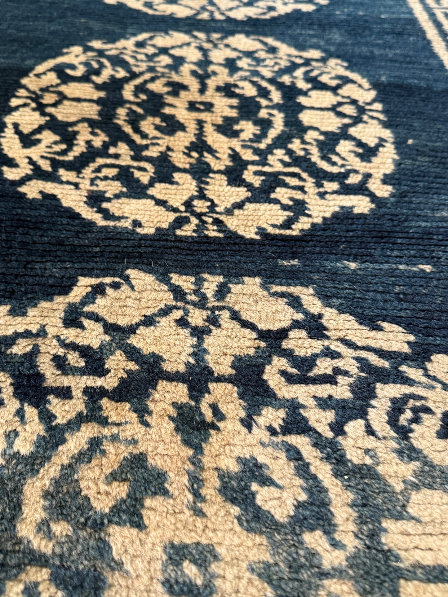 An antique Tibetan residential  rug with medallions