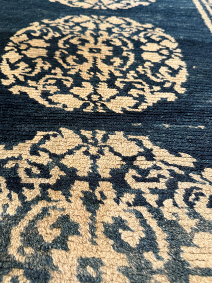 An antique Tibetan residential  rug with medallions