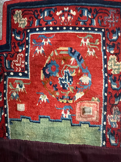 An antique Tibetan saddle rug