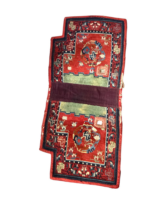 An antique Tibetan saddle rug
