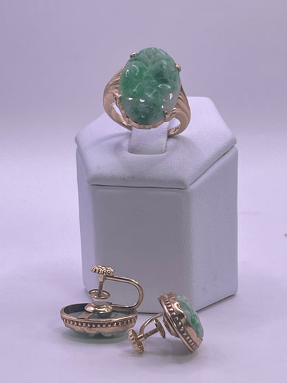 A jade jewelry set is 14kt gold setting