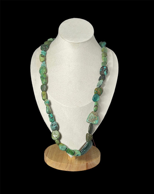 A necklace with antique Tibetan turquoise from an antique Perak