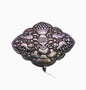An antique Tibetan silver belt buckle