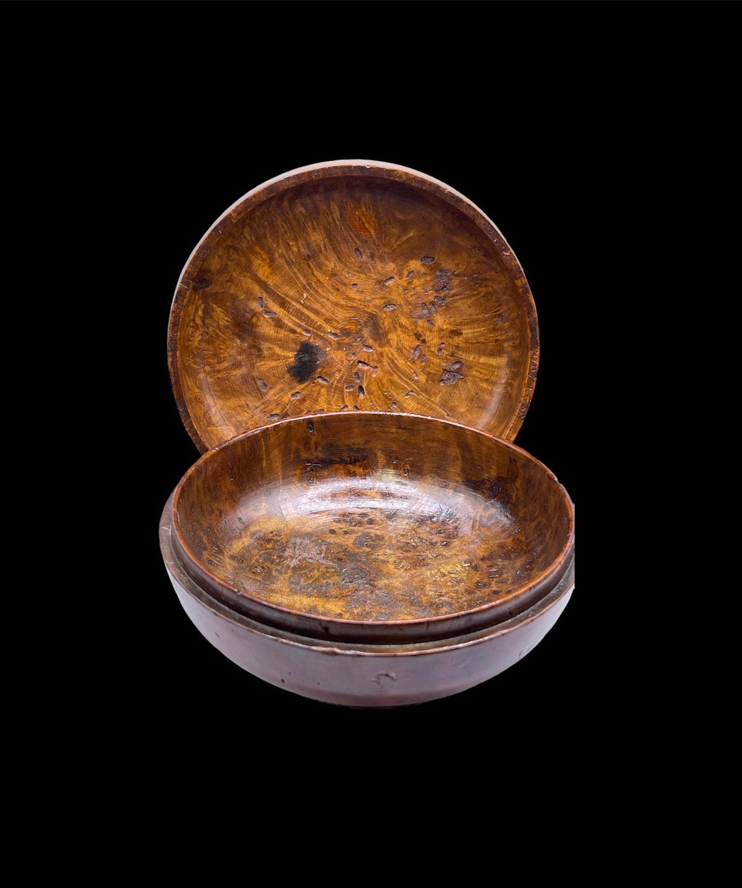An antique burlwood tsampa bowl with cover