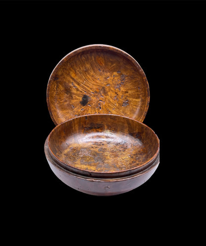 An antique burlwood tsampa bowl with cover