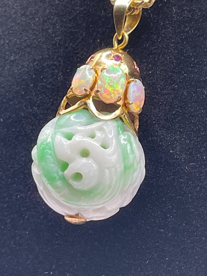Carved shou jade bead pendant with opals and ruby