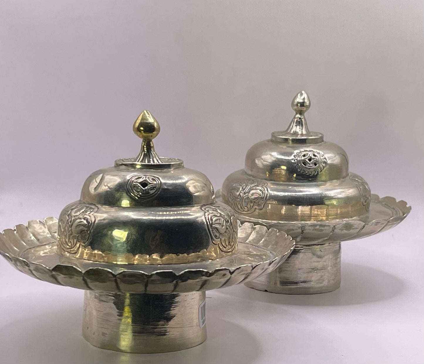 Pair of Antique silver Tibetan cup stands
