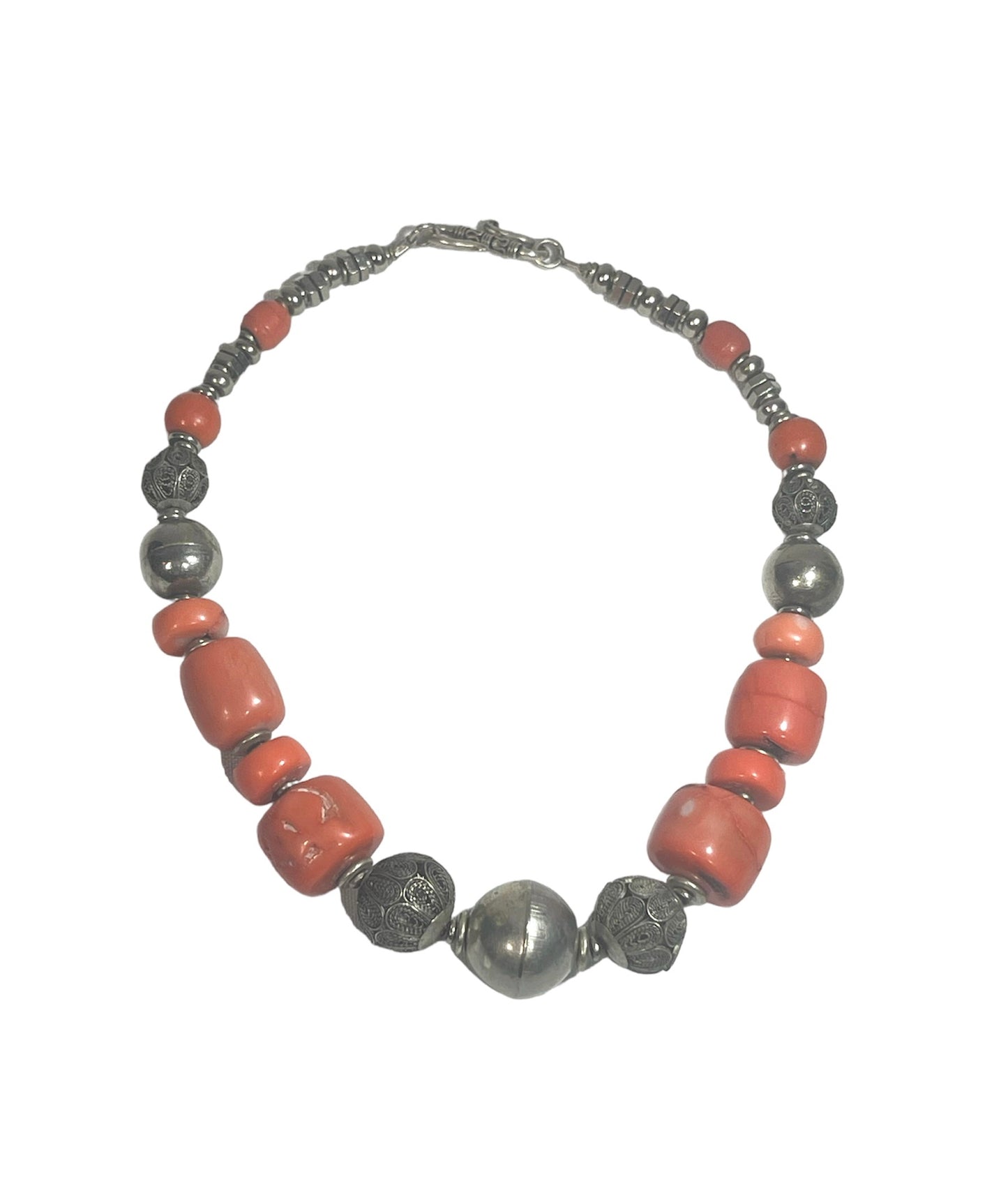 A coral and silver necklace