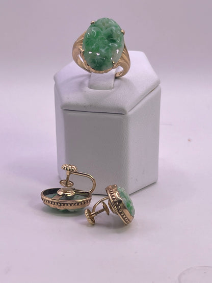 A jade jewelry set is 14kt gold setting
