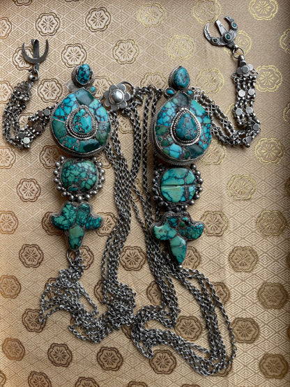 A pair of antique Tibetan earrings -aykhor